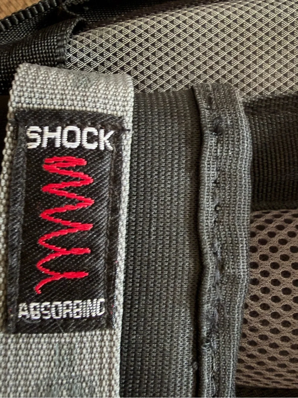 SwissGear Black and Gray Backpack with Red Logo Accent